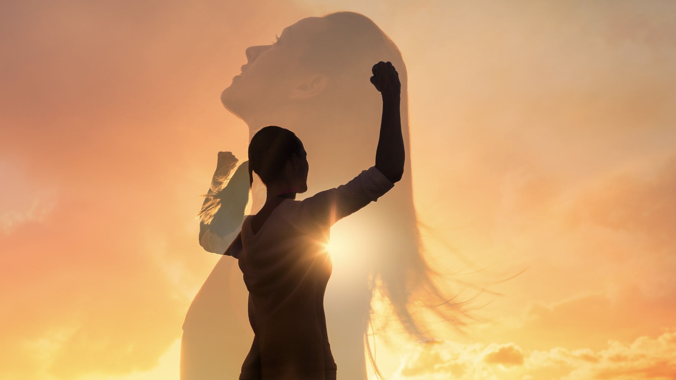 Image 9-21-25 at 6.35 PM Silhouette of a woman in the sunset with transparent overlay of another woman.